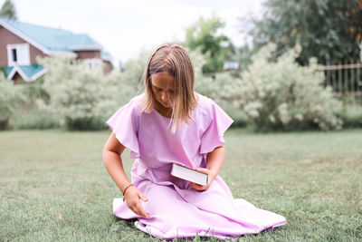 Young woman using mobile phone