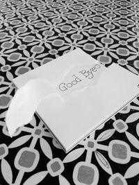 High angle view of text on white table