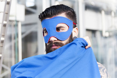 Rear view of woman wearing mask