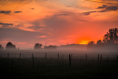 Scenic view of silhouette landscape against sky during sunset