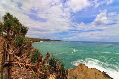 Scenic view of bay against sky