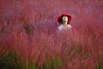 Woman standing on field