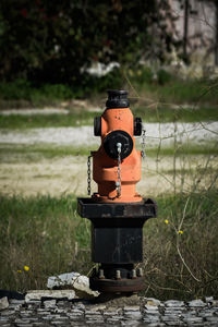 Close-up of fire hydrant on field