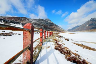 Scenic view of snowcapped mountains against sky