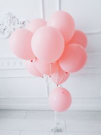 Close-up of pink helium balloons