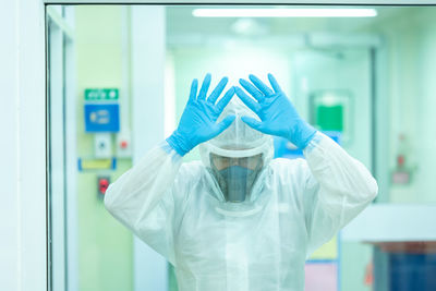 Midsection of man wearing mask