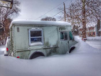 Close-up of car against sky during winter