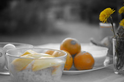Close-up of orange fruits on table