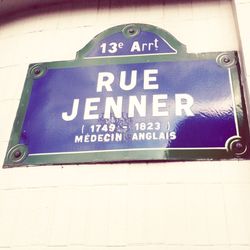 Information sign against blue sky