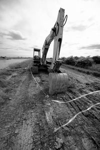 Construction site on field against sky