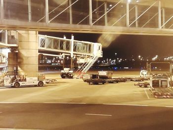 Cars on road in city at night