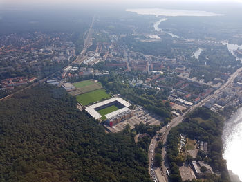 High angle view of river amidst buildings in city