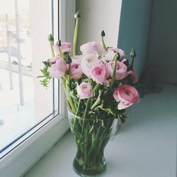 Flower vase on window sill