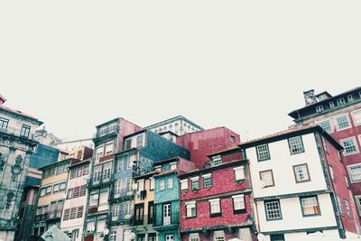 Low angle view of buildings against clear sky