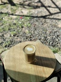 High angle view of coffee cup on table