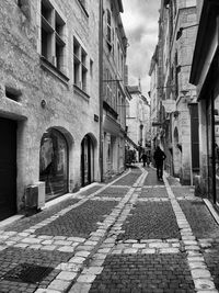 Man walking on street in city