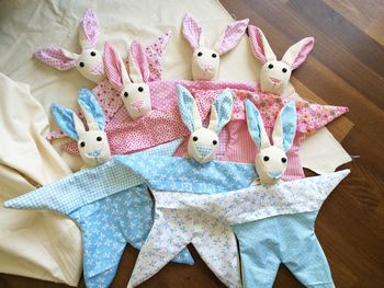 Close-up high angle view of textile bunnies