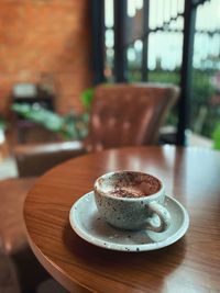 Coffee cup on table