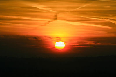 Scenic view of dramatic sky during sunset