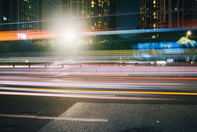 Light trails on city street at night