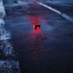 Puddle on road in rainy season