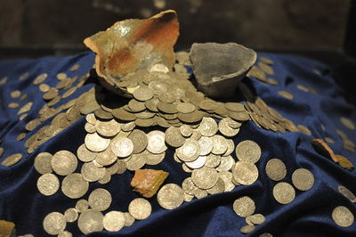 High angle view of coins on table