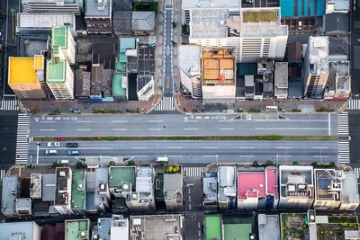 High angle view of road amidst buildings in city