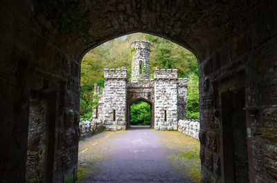 Old ruin seen through archway