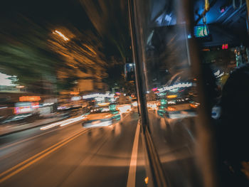 Light trails on city street at night