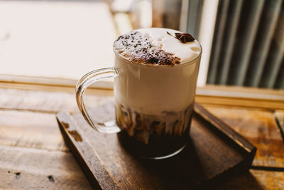 Close-up of coffee cup on table