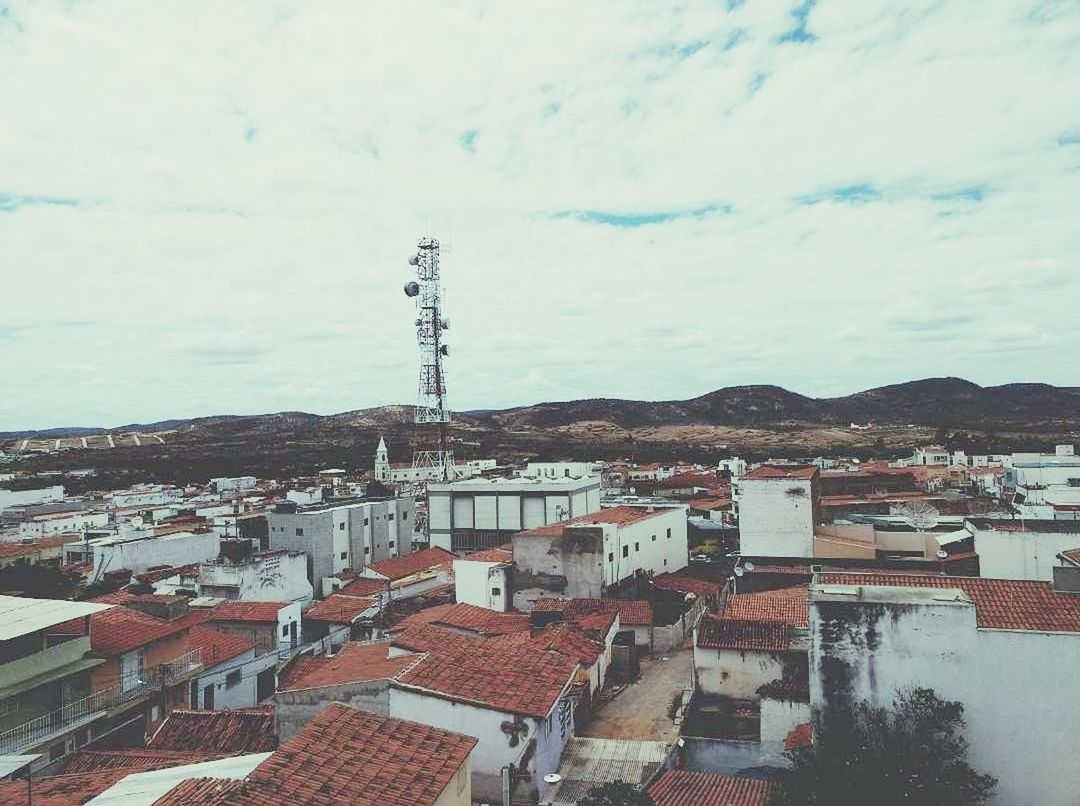 HIGH ANGLE VIEW OF TOWER AGAINST SKY IN CITY