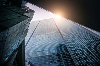 Low angle view of modern buildings against sky