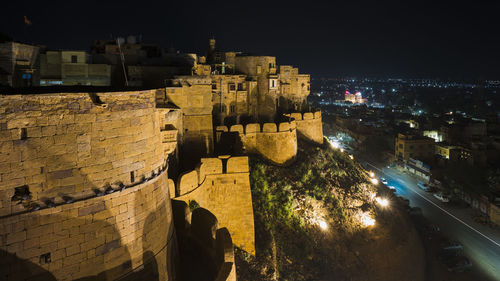 High angle view of illuminated city at night