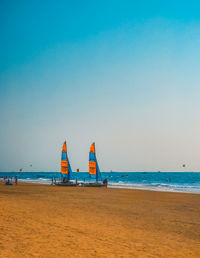 Scenic view of beach against clear sky