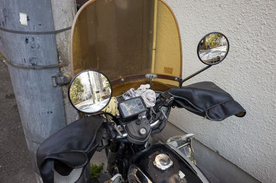 Close-up of motorcycle on street