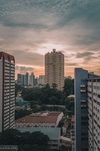 High angle view of buildings against sky during sunset