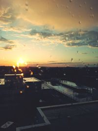 Cityscape against sky during sunset