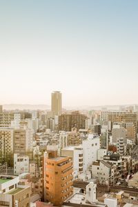 High angle view of buildings against clear sky