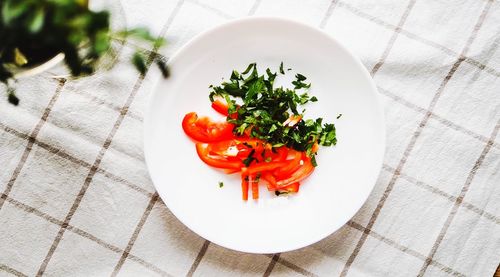 High angle view of fruit salad in plate on table