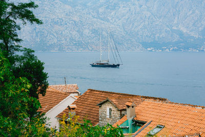 High angle view of building by sea against sky