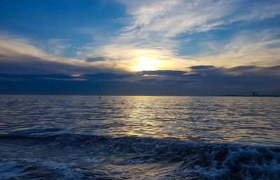 Scenic view of sea against sky during sunset