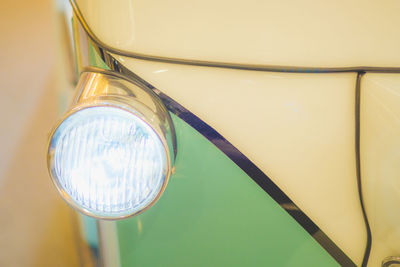High angle view of illuminated car headlight