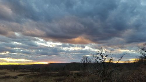 Scenic view of landscape against sky during sunset