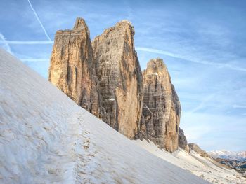 Spring on trail around tre cime di lavaredo massive. the famous mountains in dolomites