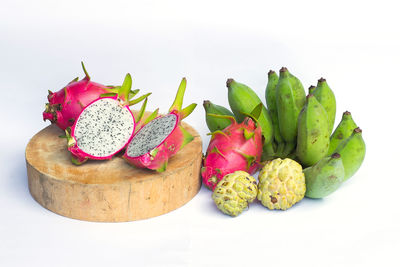 Close-up of fruits against white background