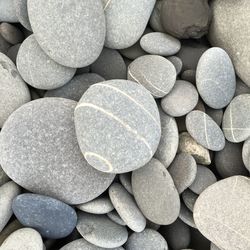 Full frame shot of pebbles at beach