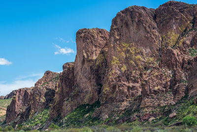 Low angle view of rock formation against sky