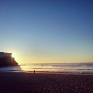 Scenic view of sea at sunset