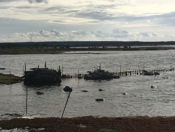 Boats moored in sea