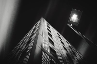 Low angle view of illuminated building at night